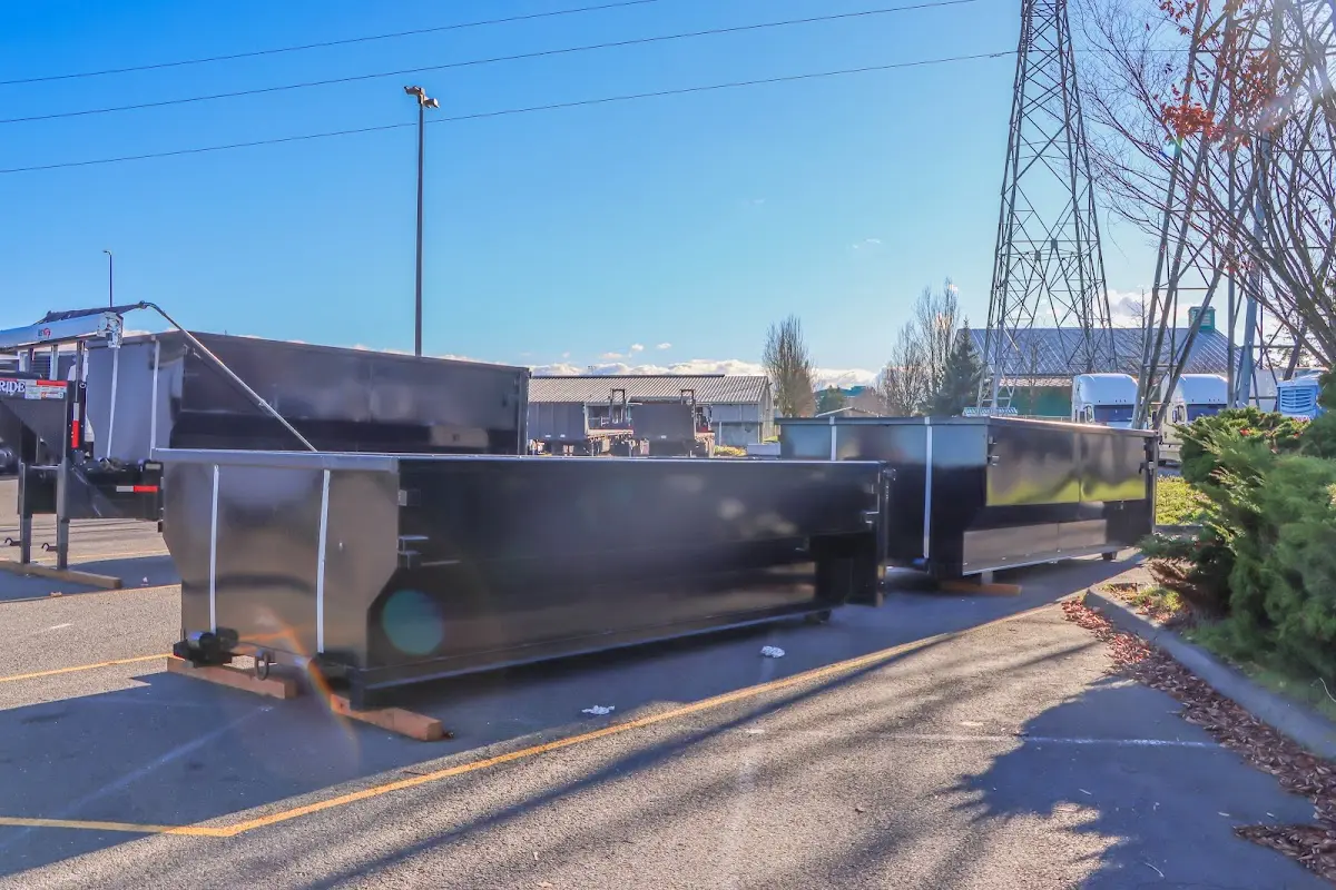 Roll-off dumpster ready for waste disposal at job site for Demolition Dumpster Rental in Millcreek